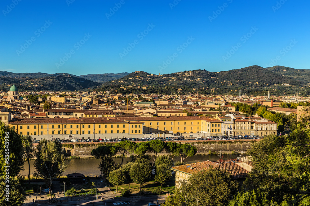 Florence, Italy. Scenic view of the Arno River and the city against the backdrop of the surrounding mountains