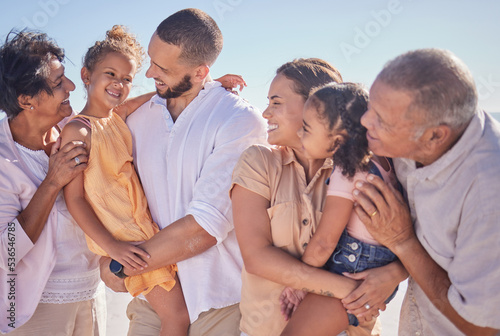 Holiday, happy and big family love to travel outdoors bonding, quality time and enjoying memories in summer. Smile, grandparents and mother with father carrying young children siblings on vacation