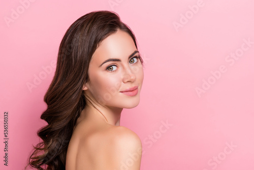 Photo of adorable charming young woman naked shoulders smiling wear empty space isolated pink color background