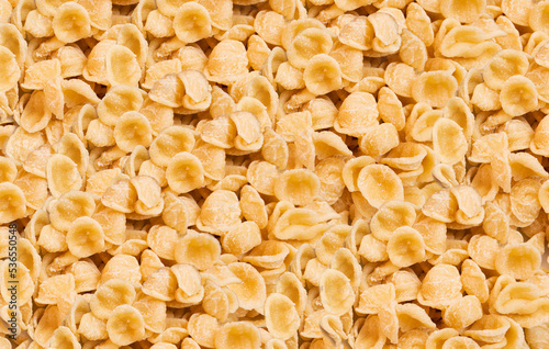 Background pattern of orecchiette, a traditional type of pasta of south italy