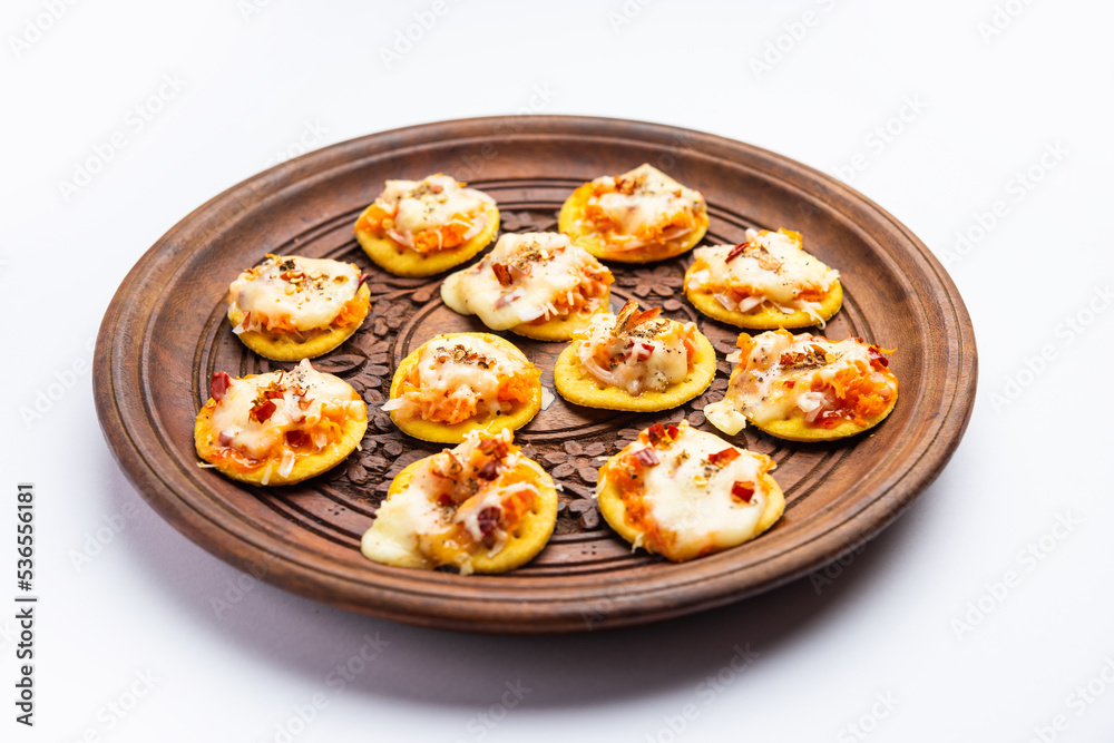 Papdi pizza are mini food bites, Indian kids favourite party snack Papdi pizza are mini food bites, Indian kids favourite party snack