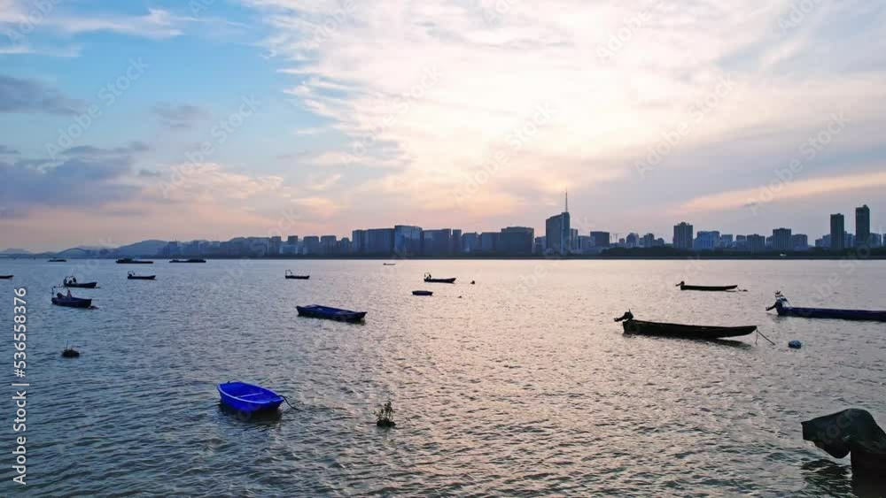 aerial view of boats on qiantang river in blue cloud sky aerial view of boats on qiantang river in blue cloud sky