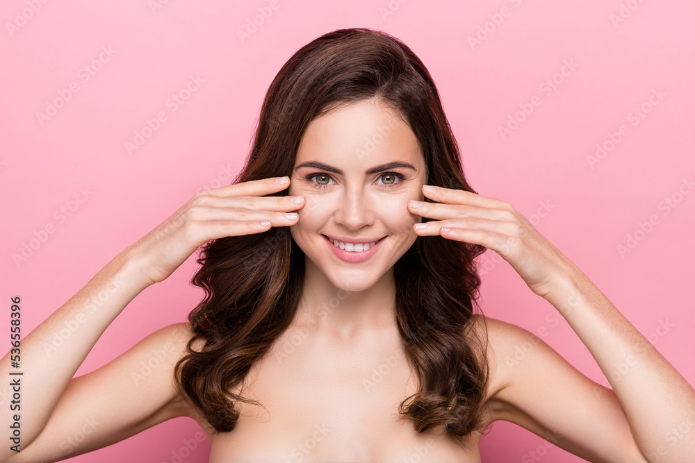 Obraz premium Photo of young cheerful lovely girl hands touch skin pure perfect tone isolated over pink color background