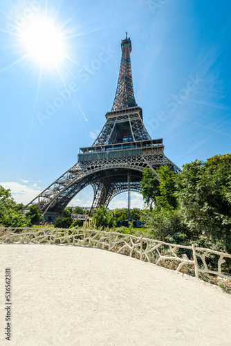The famous Eiffel Tower in Paris with a dramatic sky
