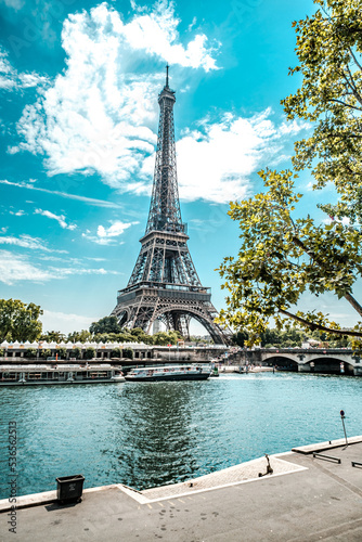 The famous Eiffel Tower in Paris with a dramatic sky