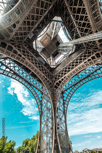 The famous Eiffel Tower in Paris with a dramatic sky