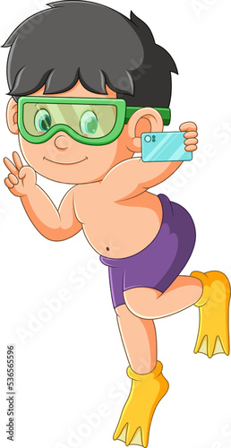 The cool boy is diving and taking the selfie under the water