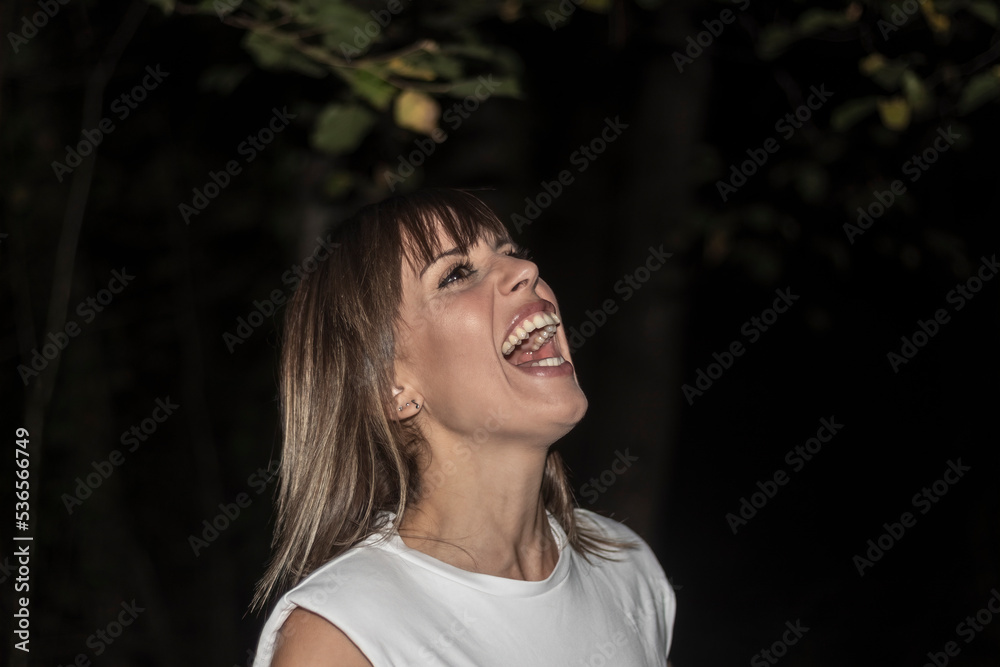 Emotional blonde woman opening her mouth very loudly screaming dissatisfied with something expressing disagreement and annoyance. Women yelling at her boyfriend, negative emotions and feelings
