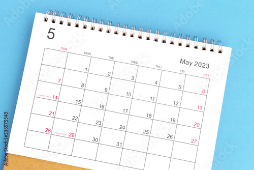 calendar may 2023 top view on a blue background