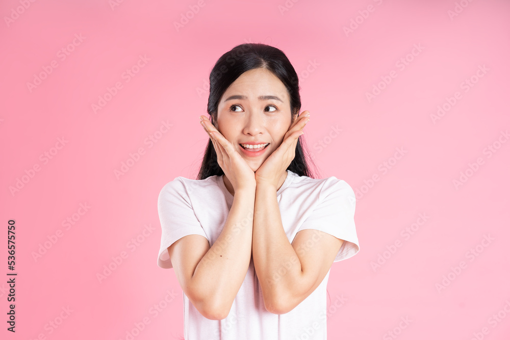 beautiful asian girl portrait, isolated on pink background beautiful asian girl portrait, isolated on pink background