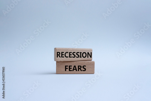 Recession fears symbol. Concept words Recession fears on wooden blocks. Beautiful white background. Business and Recession fears concept. Copy space.