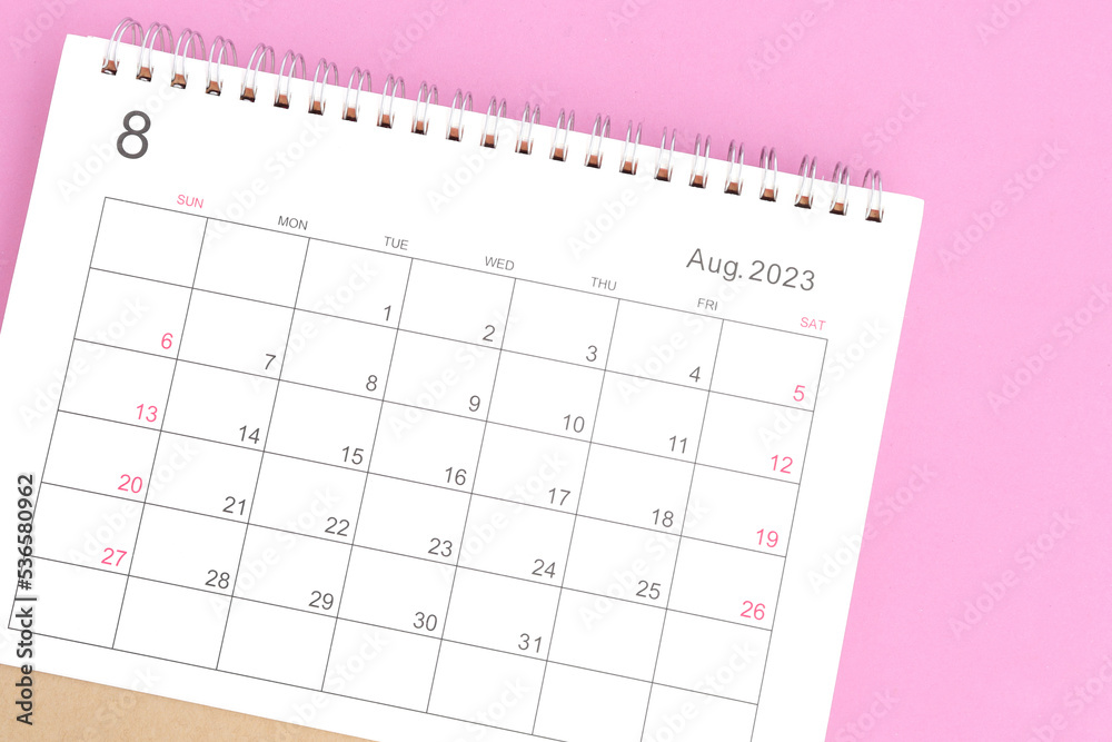 close-up of calendar August month of 2023 on a pink background - obrazy, fototapety, plakaty 