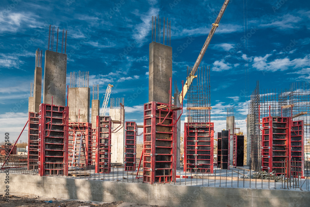 Column formwork and crane on house construction. Stock Photo Adobe Stock