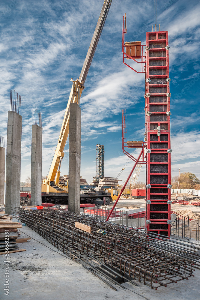Column formwork and crane on house construction. Stock Photo Adobe Stock