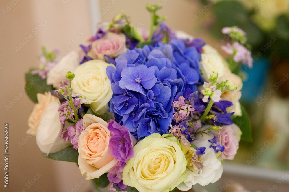 Bright wedding bouquet for the ceremony from fresh flowers