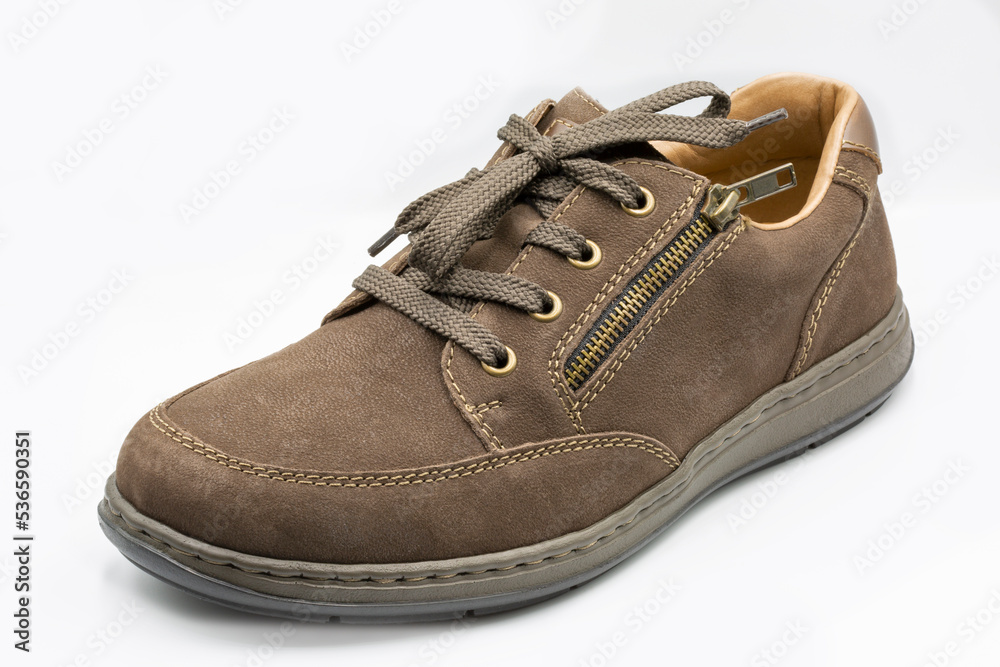 Brown man nubuck shoe with shoelace on white.
