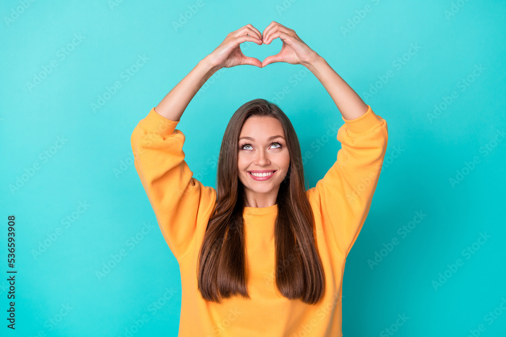 Photo of lovely pretty lady make heart fingers forever love sign isolated on cyan color background
