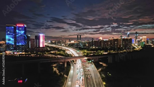 aerial view of city road and cityscape of hangzhou xiaoshan at twilight photo