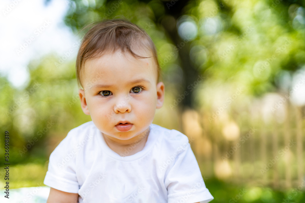 Cute funny kid with blur background. Portrait of happy little boy. Cute funny kid with blur background. Portrait of happy little boy.