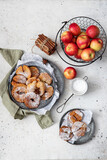 Sweet pancakes with apples, cinnamon and powdered sugar	