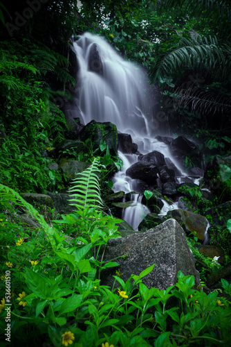 a photo of a waterfall in Aceh Indonesia during the day