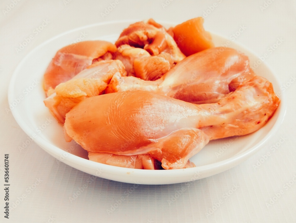 Raw fresh chicken meat white-meat murghi ka gosht boti raw-frango raw-poulet, food uncooked poultry-meat raw-pollo hen-meat cut pieces on a plate fillets and drumstick bird-meat closeup image photo Raw fresh chicken meat white-meat murghi ka gosht boti raw-frango raw-poulet, food uncooked poultry-meat raw-pollo hen-meat cut pieces on a plate fillets and drumstick bird-meat closeup image photo