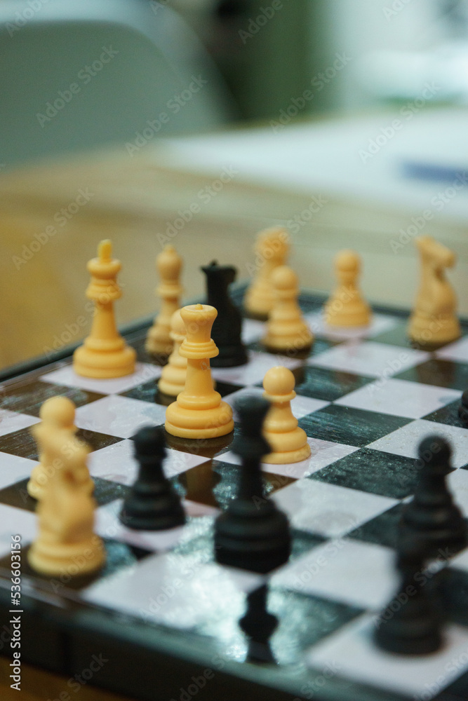 chess pieces on a chessboard chess pieces on a chessboard