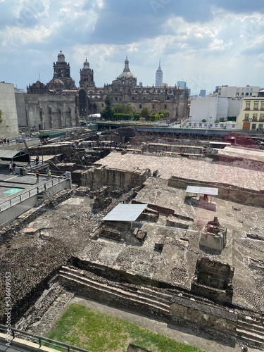 Tenochtitlan Ruins at Templo Mayor with Mexico City Metropolitan Cathedral in Background photo