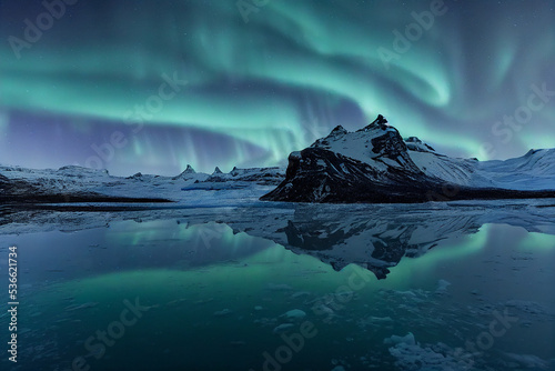 Spectacular Polar Lights Over Arctic Rocky Seascape 3D Artwork Scenic Nature Background. Magnificent Aurora Borealis Above Northern Snowy Mountains and Sea Stunning Night Photography Awesome Wallpaper