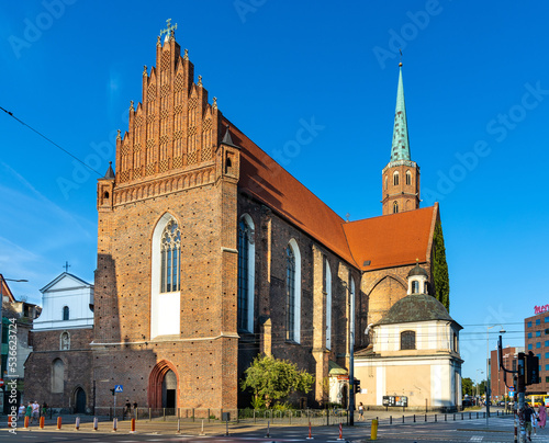 St. Adalbert St. Wojciech Dominican gothic church at Dominikanski square in historic old town quarter of Wroclaw in Poland photo