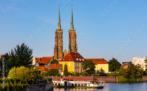 Panoramic view of Ostrow Tumski Island with St. John Baptist othic cathedral over Odra river in historic old town quarter of Wroclaw in Poland