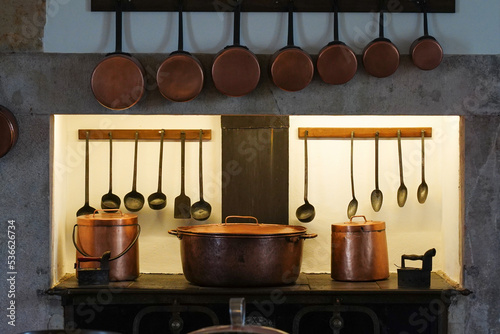 Historic copper kitchen pots, pans and utensils