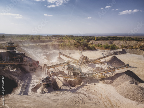 Crushed stone quarry machine at work.