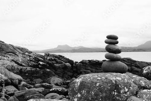 Canvas Print Grayscale shot of stones stacked on top of each other