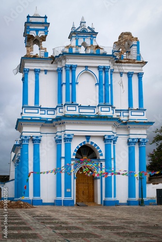 Beautiful blue and white church damaged by an earthquake