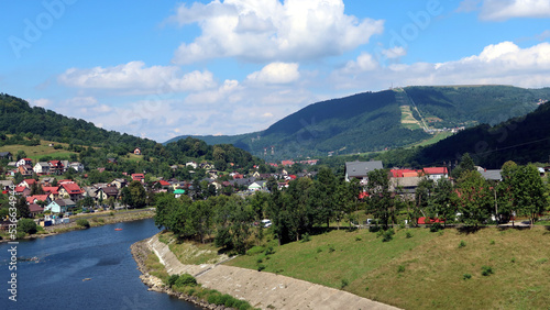 Fototapeta Naklejka Na Ścianę i Meble -  Summer lanscape view from Tresna Dam to Beskid mountains with Sola river and Zar Mount, Poland