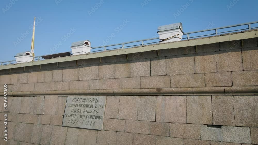 custom made wallpaper toronto digitalAerial parallel along view of wall of the Peter-Pavel's Fortress, Church next to the river and water channel in the historical centre of city of St. Petersburg at sunny summer sunrise, camera up