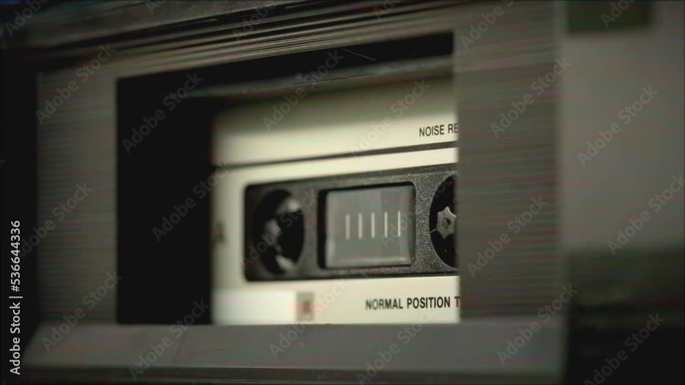 Retro radio tape recorder, audio cassette playing close-up. Listening to music, recording studio old radio boombox player, searching channel, volume. Retro radio tape recorder, audio cassette playing close-up. Listening to music, recording studio old radio boombox player, searching channel, volume.