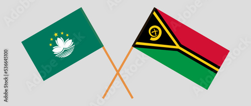 Crossed flags of Macau and Vanuatu. Official colors. Correct proportion