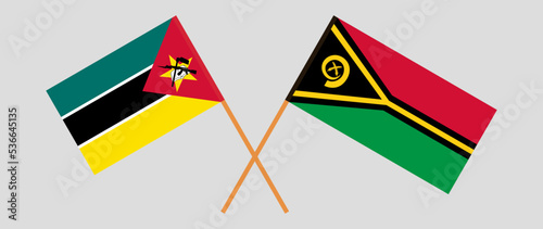 Crossed flags of Mozambique and Vanuatu. Official colors. Correct proportion Free Download Crossed flags of Mozambique and Vanuatu. Official colors. Correct proportion - GFXLoad