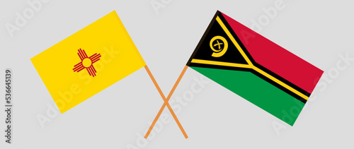 Crossed flags of the State of New Mexico and Vanuatu. Official colors. Correct proportion