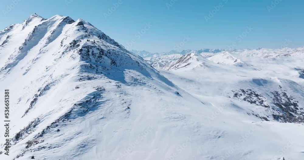 Aerial view snow covered mountains in winter Aerial view snow covered mountains in winter
