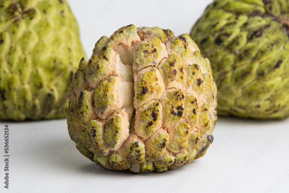 sugar apple ( srikaya ) with black spots, isolated on a white ...