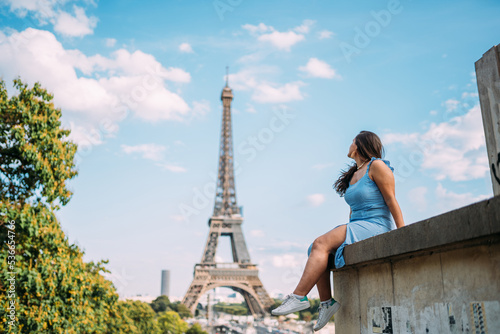 Holidays in Paris. Young girl enjoying Paris, France. Summer vacation in Europe. Eiffel Tower. © Brastock Images
