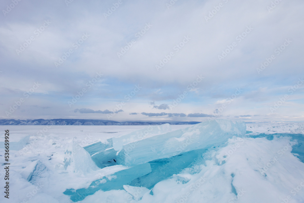 Turquoise ice floe. Winter landscape. Baikal lake Turquoise ice floe. Winter landscape. Baikal lake