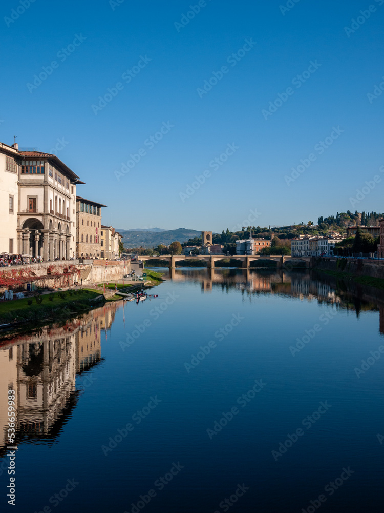 Florence, Italy - November, 2011: a bridge on arno river on sunny day
