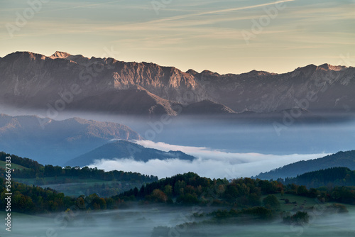sunrise in the mountains with fog