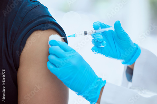 Healthcare nurse and covid vaccine patient injection for virus immunity and protection in pandemic. Closeup of medical worker with coronavirus vaccination syringe for serious sickness prevention