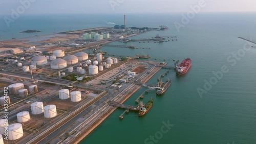 Oil refinery of business logistic sea going ship, the natural gas pipeline for oil delivery ships. to Port of europe-Cargo ship import export, international order concept. 