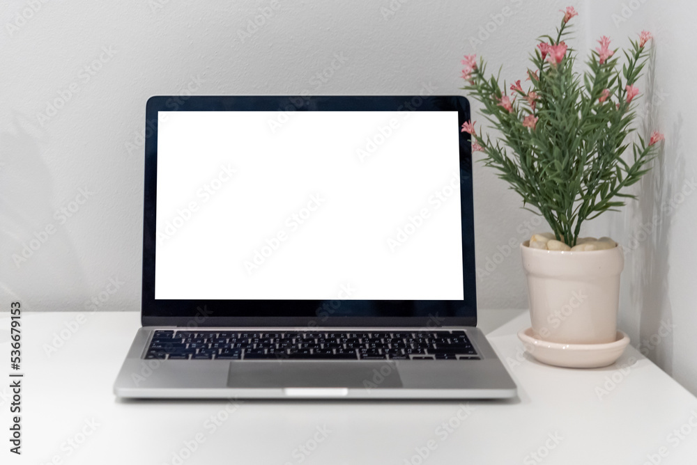 Computer laptop mock up with blank screen on desk.modern technology concept. Computer laptop mock up with blank screen on desk.modern technology concept.
